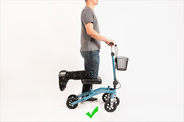 A clean workspace featuring a digital checklist for common knee scooter adjustment questions.