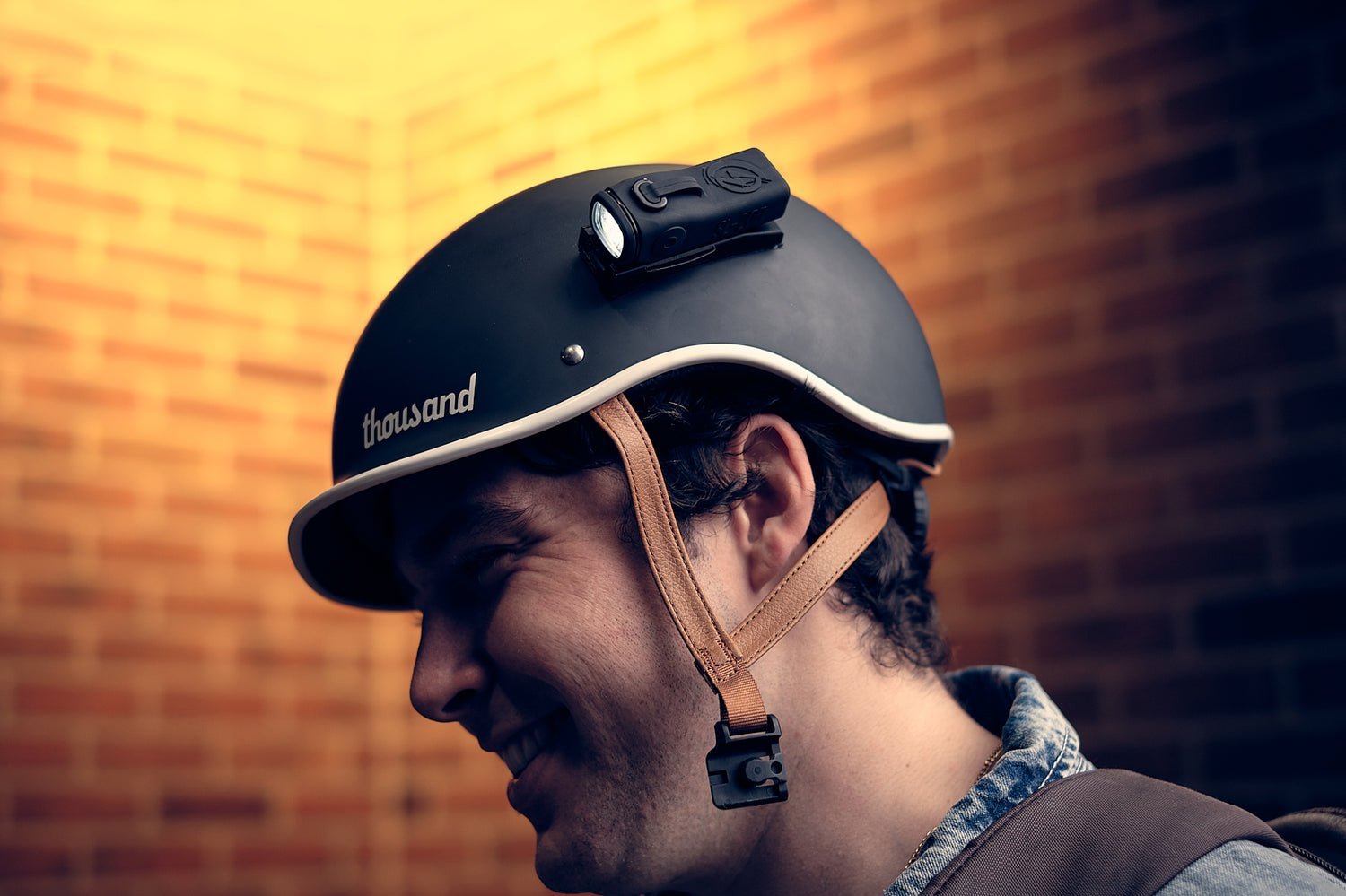 A bike helmet secured snugly to a bicycle frame to ensure safety.