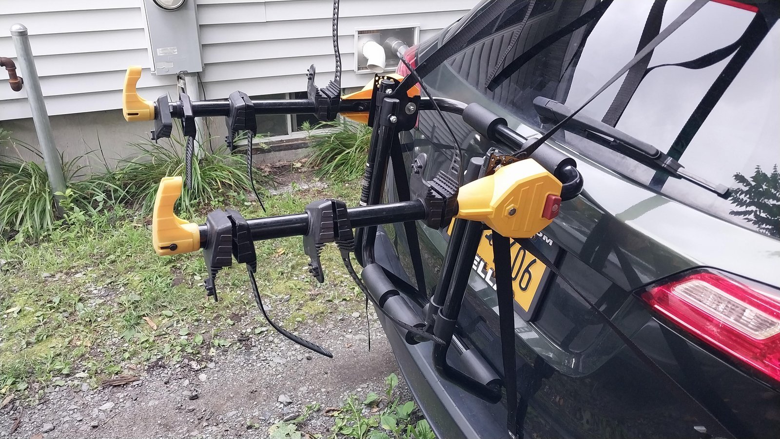 Checking the stability of a securely mounted Rhode Gear bike rack.