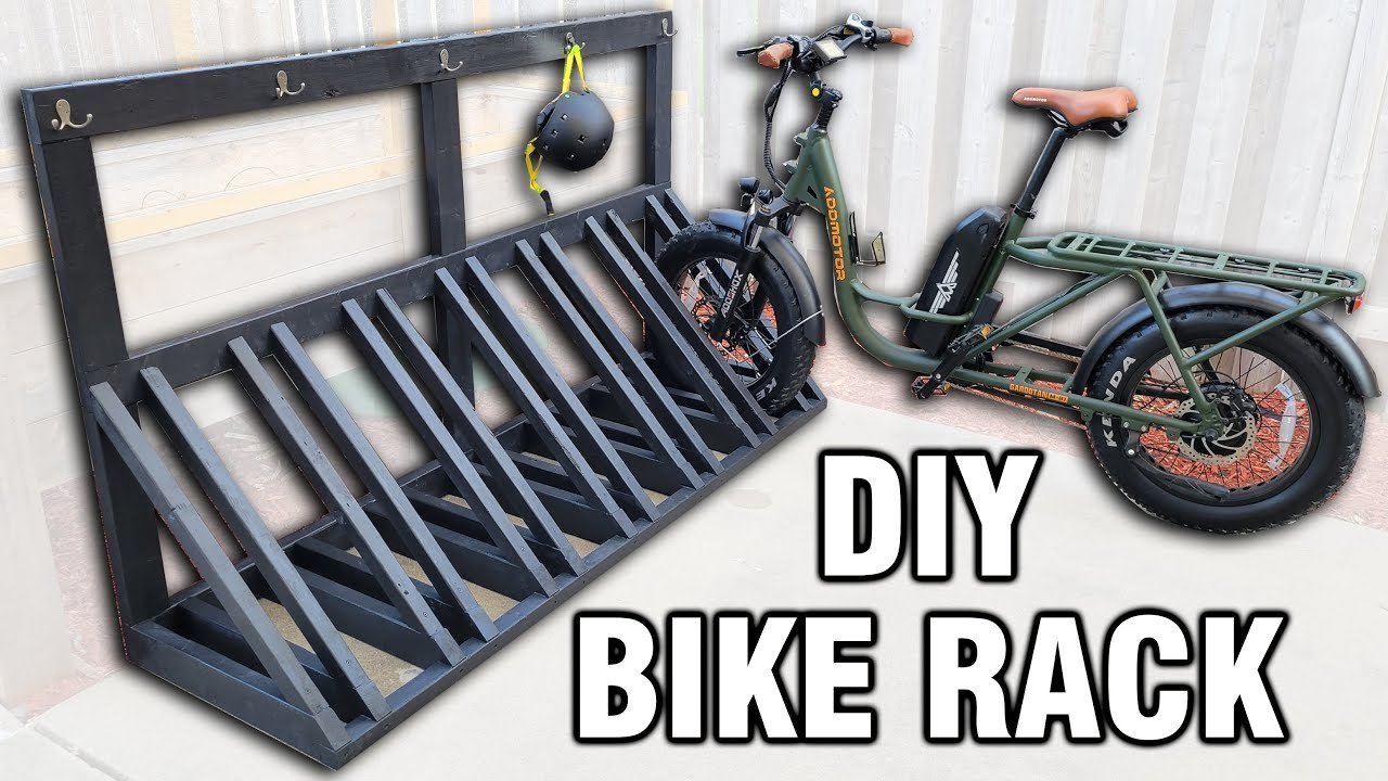 Essential lumber boards, screws, and a power drill laid out for bike rack construction.