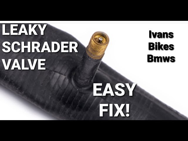 Close up of a bicycle tube showing a pinch flat puncture mark.