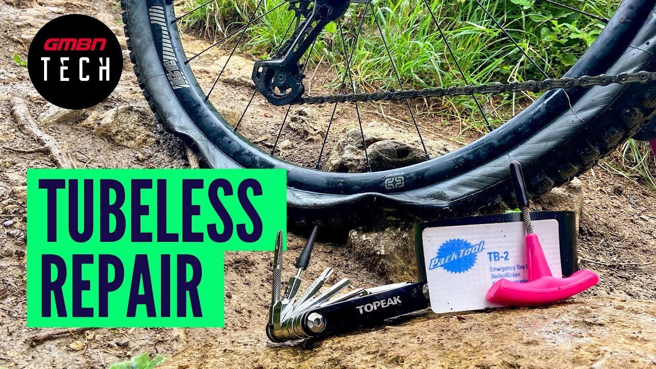 Dried sealant and damaged rim tape inside a bicycle tire casing.