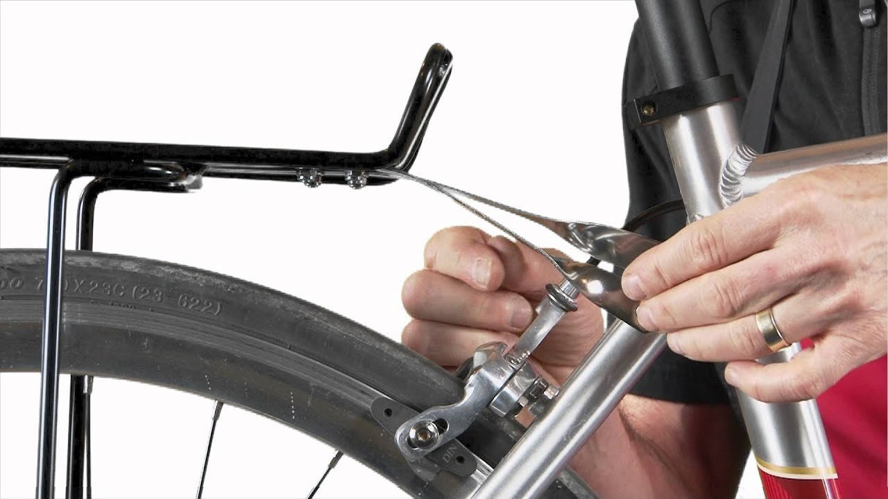 Essential tools and hardware needed to install a rear bike rack.