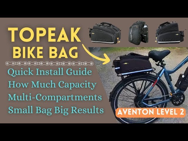 Testing the stability of a securely mounted Topeak bike rack on a bicycle.