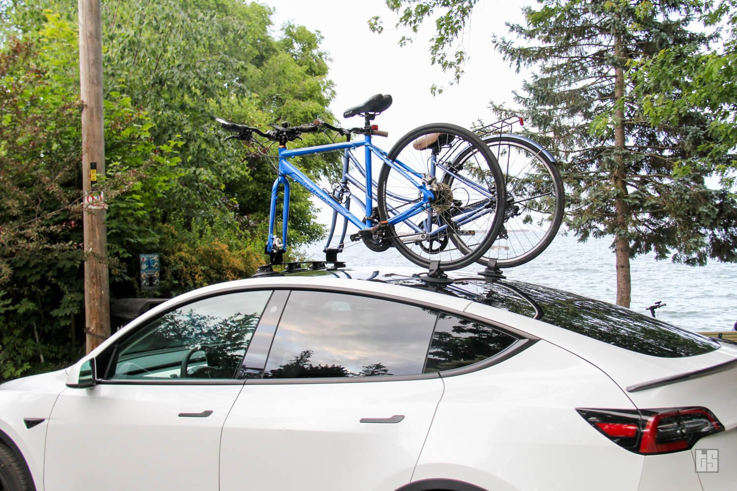 Testing the stability of a newly installed bike rack on the vehicle.
