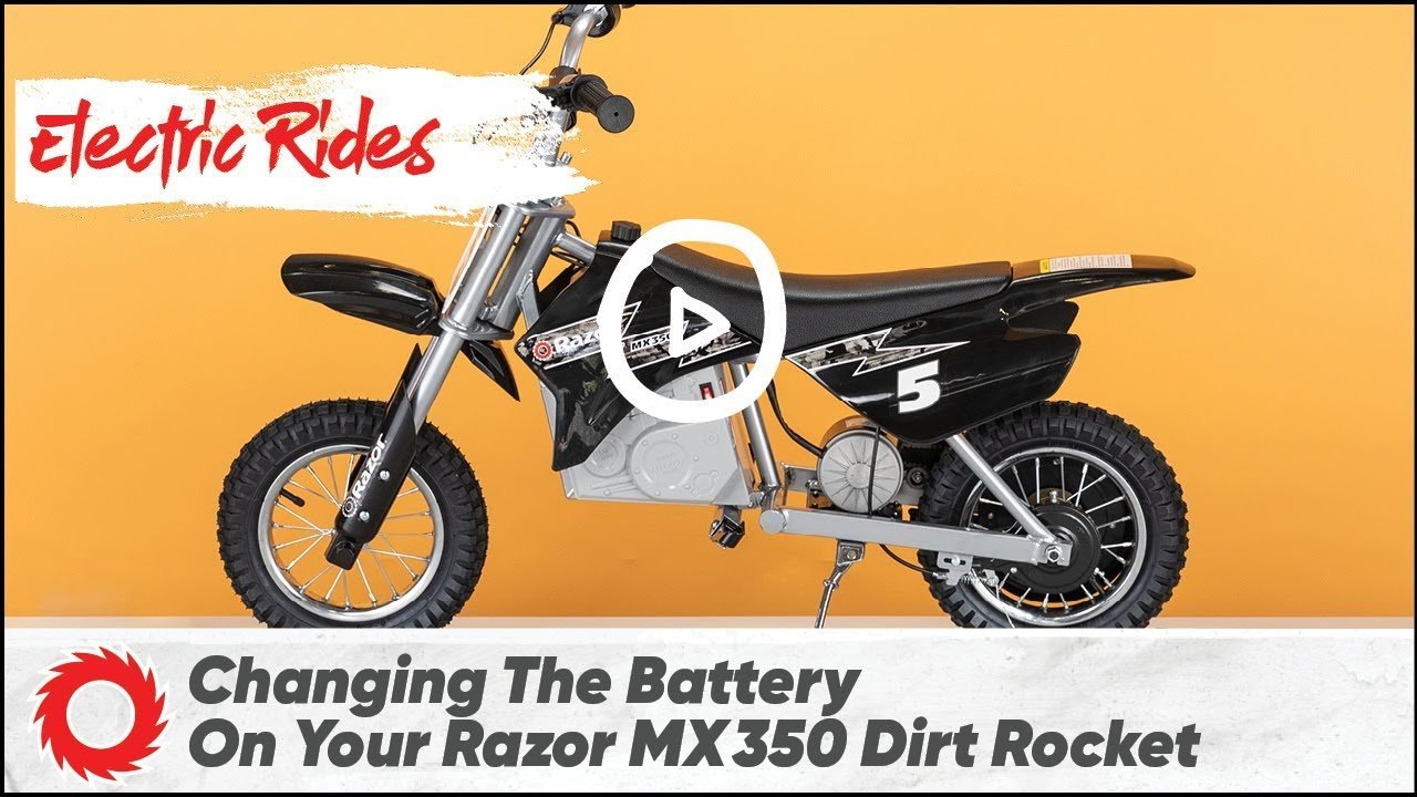 Tools and a new battery pack ready for a Razor dirt bike repair.
