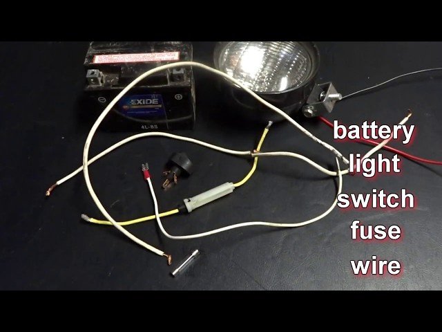 A clean and secure wiring installation on a dirt bike frame.